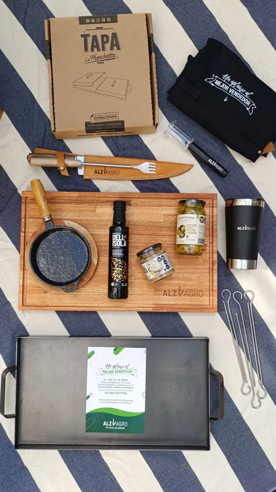 Alzagro: kit de asado con tabla, plancha, especias y aceite de oliva